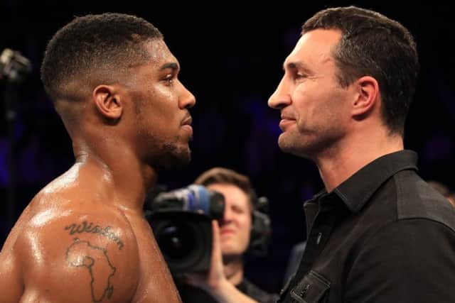 Anthony Joshua , left, and Wladimir Klitschko in Manchester. Picture: Getty.