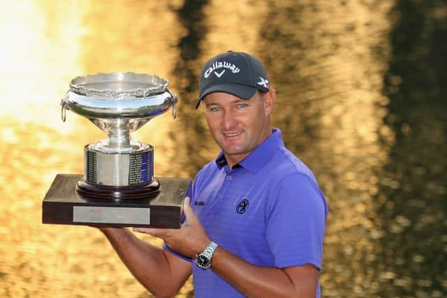Sam Brazel of Australia poses with the trophy after winning the UBS Hong Kong Open. Picture: Warren Little/Getty Images