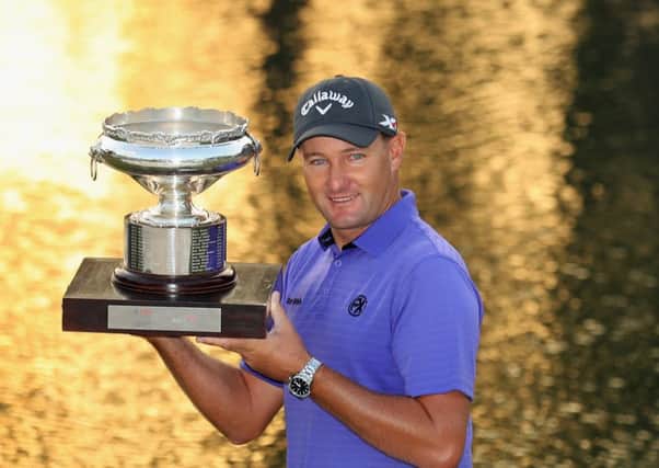 Sam Brazel of Australia poses with the trophy after winning the UBS Hong Kong Open. Picture: Warren Little/Getty Images