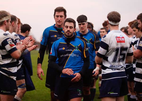 Disappointed Boroughmuir players leave the field at Goldenacre. Picture: Scott Louden.