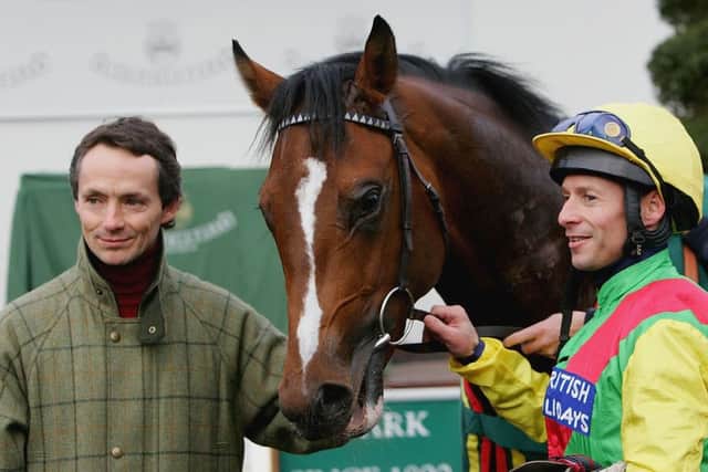 Walter Swinburn, left, in his training days, with jockey Richard Quinn and Grand Show at Lingfield racecourse in November 2004. Picture: Julian Herbert/Getty Images