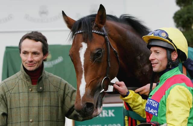 Walter Swinburn, left, in his training days, with jockey Richard Quinn and Grand Show at Lingfield racecourse in November 2004. Picture: Julian Herbert/Getty Images