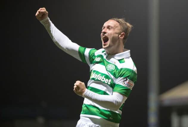 Leigh Griffiths celebrates after scoring in Celtic's 4-1 win over Partick Thistle. Picture: PA