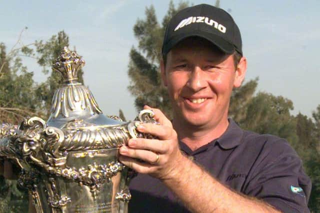Scotland's Gary Orr shows off the trophy after winning the Portuguese Open in 2000. Picture: Gael Cornier/AP