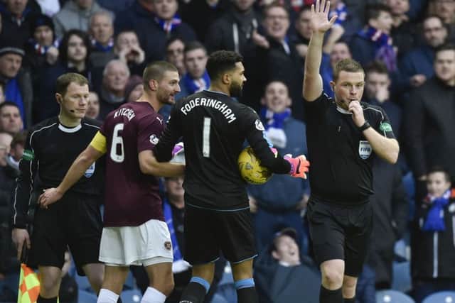 Referee John Beaton rules out Don Cowie's 16th-minute goal at Ibrox for offside.