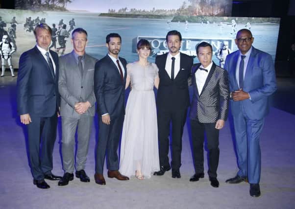 Members of the cast, including Felicity Jones, line up for the UK premiere of Rogue One: A Star Wars Story at the BFI Imax in London. Picture: AP