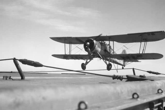 A Swordfish aircraft touches down on Ark Royal. Picture: PA/MOD