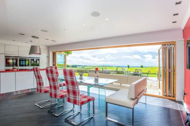 The dining room opens up to reveal a spectacular panoramic vista. Picture: ckdgalbraith.co.uk
