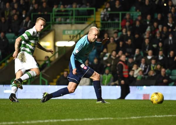 Celtic's Leigh Griffiths opens the scoring against Hamilton. Picture: SNS
