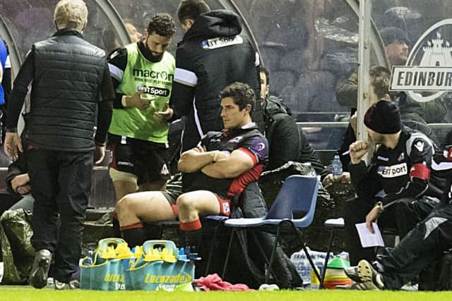 Edinburgh's Phil Burleigh sits it out after being sent off against Stade Francais. Picture: Ross Parker/SNS