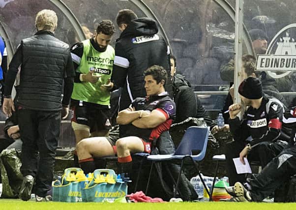 Edinburgh's Phil Burleigh sits it out after being sent off against Stade Francais. Picture: Ross Parker/SNS