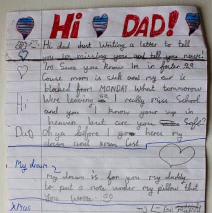 A childs heartbreaking Christmas letter to their dead dad that was found in a field tied to a balloon in a field near Dunfermline, Fife. Picture: SWNS/Centre Press