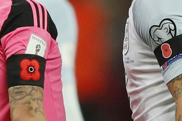 Poppy armbands were worn by both Scotland and England players during the match. Picture: Getty