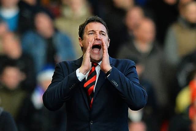 Malky Mackays downfall as Cardiff manager continues to haunt him, brought about by texts from and to head of recruitment Ian Moody. Picture: Paul Ellis/AFP/Getty Images