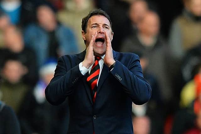 Malky Mackay is a the centre of a £10m claim for damage. Picture: /AFP/Getty Images