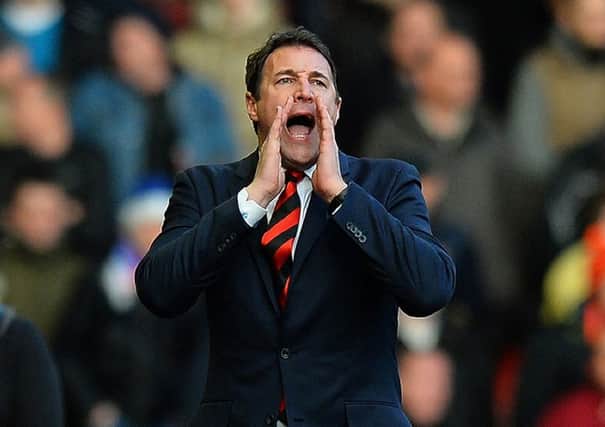 Malky Mackay is a the centre of a Â£10m claim for damage.        Picture: /AFP/Getty Images