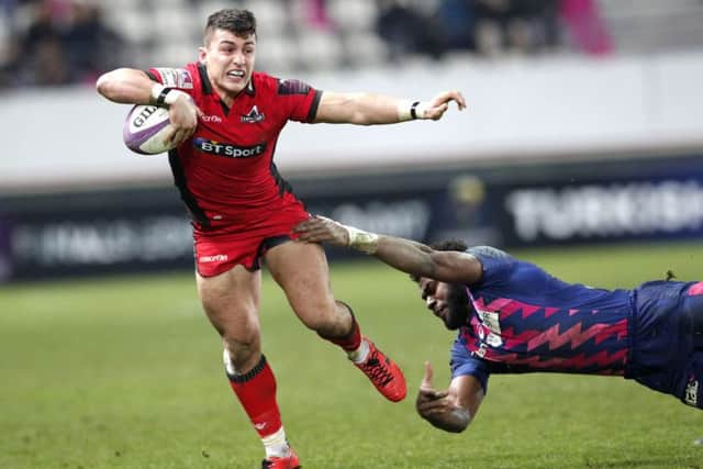 Stade Francais' Josaia Raisuqe, right, tries to stop Edinburgh's Damien Hoyland during their European Challenge Cup clash. Picture: AP Photo/Christophe Ena