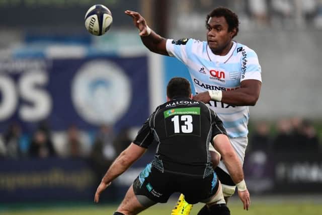 Racing 92's Leon Nakarawa in action against his forrmer Glasgow Warriors team-mate Alex Dunbar.  Picture: Getty Images/AFP