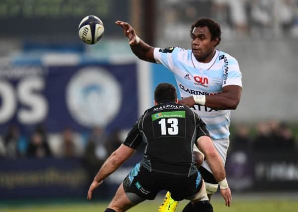 Racing 92's Leon Nakarawa in action against his forrmer Glasgow Warriors team-mate Alex Dunbar.  Picture: Getty Images/AFP
