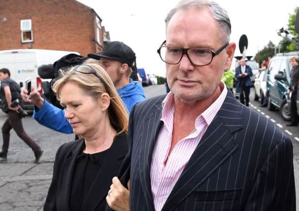 Former England footballer Paul Gascoigne  leaves Dudley Magistartes Court after  being fined Â£1,000 and ordered to pay Â£1,000 in compensation by a court on Monday for making a racist comment to a black security guard at his 'An Evening With Gazza show' last year. Picture: Getty Images