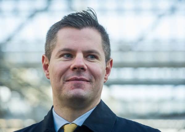 Derek Mackay gave cash-strapped councils a boost and confirmed he would not increase the basic rate of income tax. Picture: Steven Scott Taylor