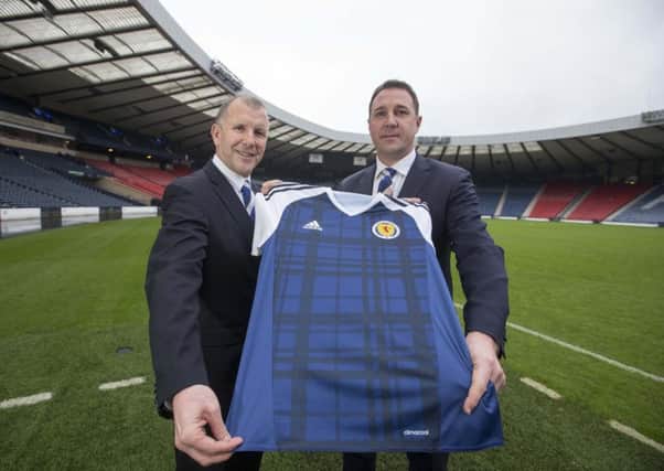 Scottish FA chief executive Stewart Regan with new performance director Malky Mackay. Picture: Jeff Holmes/PA Wire