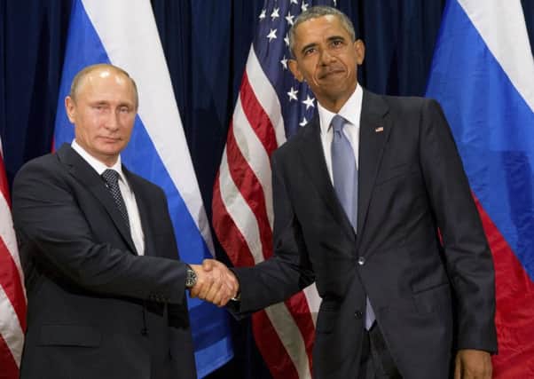 Presidents Obama and Putin have spoken about the hacking. Picture: AP