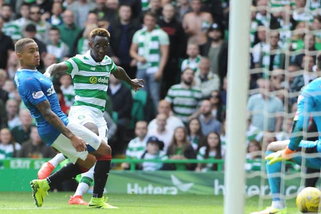 Moussa Dembele fires the ball through the legs of Wes Foderingham during the first Old Firm derby of the 2016/17 season. Picture: John Devlin
