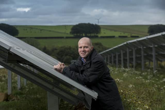 Mackie's MD Mac Mackie at his firm's solar farm in Aberdeenshire - the largest privately-owned facility of its type in the country. Picture: Contributed