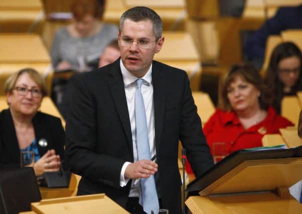 Finance Secretary Derek Mackay outlining his first Scottish budget. Picture; PA