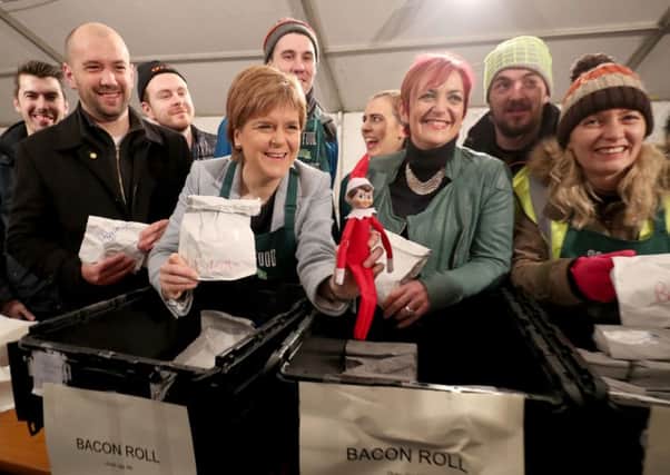 First Minister Nicola Sturgeon serving breakfast in Charlotte Square, Edinburgh for participants in the first Social Bite CEO Sleepout. Picture; PA