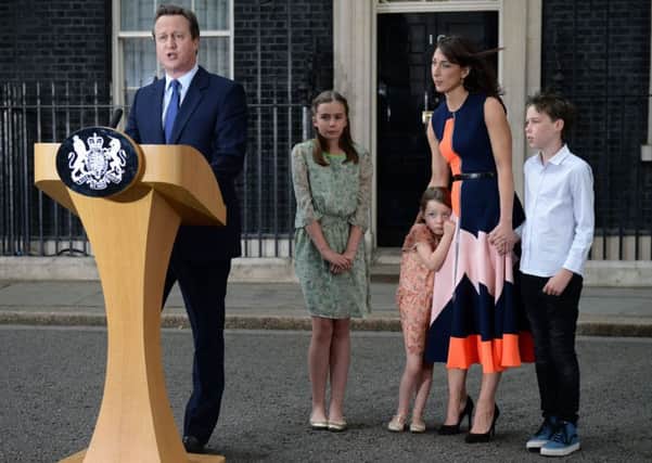 Cameron announces his resignation in Downing Street beside his daughters Nancy Gwen, Florence Rose Endellion, his wife Samantha and son Arthur Elwen. Picture: Oli Scarff/Getty