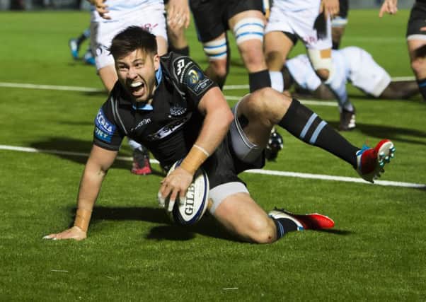 Ali Price celebrates after scoring Glasgow Warriors' third try in the win over Racing. Picture: Paul Devlin/SNS