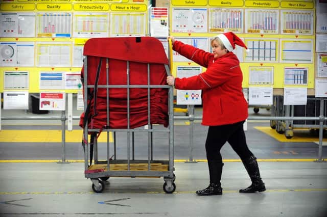 Staff member Joanna McCartney at the Royal Mail Distribution centre in Glasgow. Picture: Getty Images
