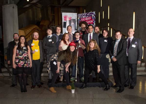 The group who took to the stage at the Scottish Parliament and put on a show for more than 100 guests