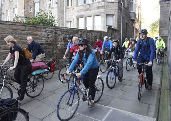 Cyclists in a show of support of a cycle path in Roseburn in August. Picture: Greg Macvean