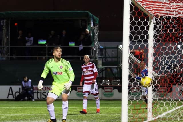 Accies goalkeeper Gary Woods looks on as Rangers' Martyn Waghorn (not pictured) scores the opening goal. Picture: PA