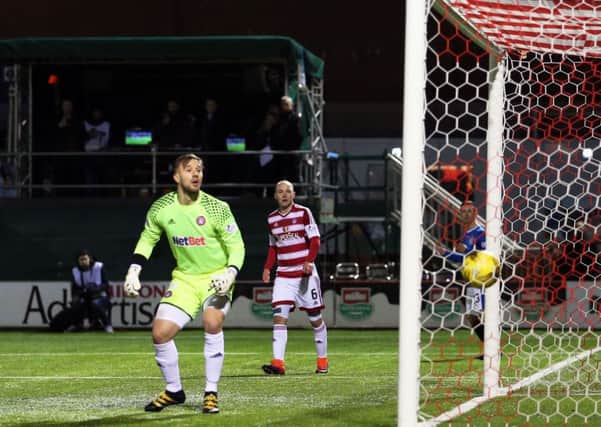 Accies goalkeeper Gary Woods looks on as Rangers' Martyn Waghorn (not pictured) scores the opening goal. Picture: PA