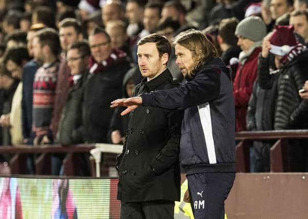 Hearts manager Ian Cathro (left) consults with his assistant Austin McPhee during the 1 - 1 draw with Partick Thistle at Tynecastle. Pitcure: Craig Foy/SNS