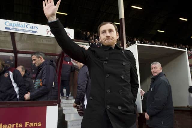 Hearts head coach Ian Cathro acknowledges the fans ahead of his home bow. Picture: Craig Foy/SNS