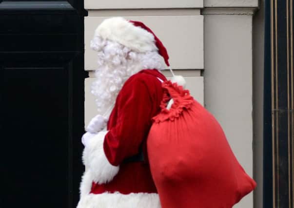 A man dressed as Father Christmas. Picture: Anthony Devlin/PA Wire