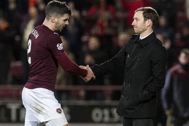 Callum Paterson shakes the hand of head coach Ian Cathro after Hearts' 1-1 draw with Partick. Pic: SNS