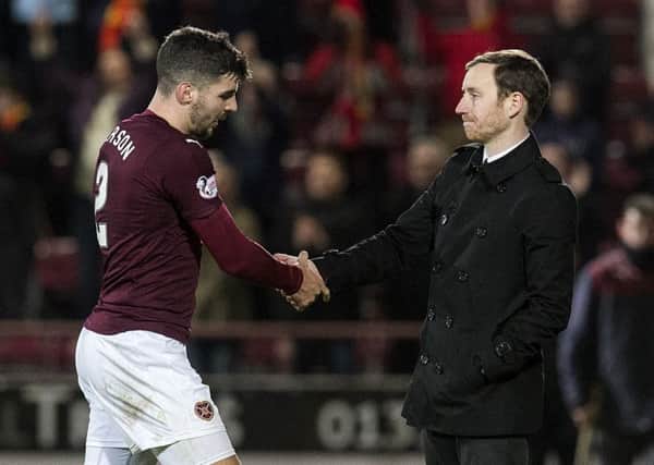 Callum Paterson shakes the hand of head coach Ian Cathro after Hearts' 1-1 draw with Partick. Pic: SNS