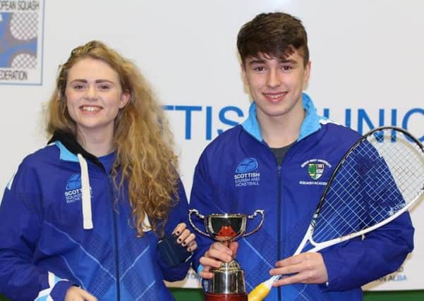 Elspeth Young, 2015 U19 Scottish Junior Open champion, with Alasdair Prott, who faces tough opposition in this years event.
