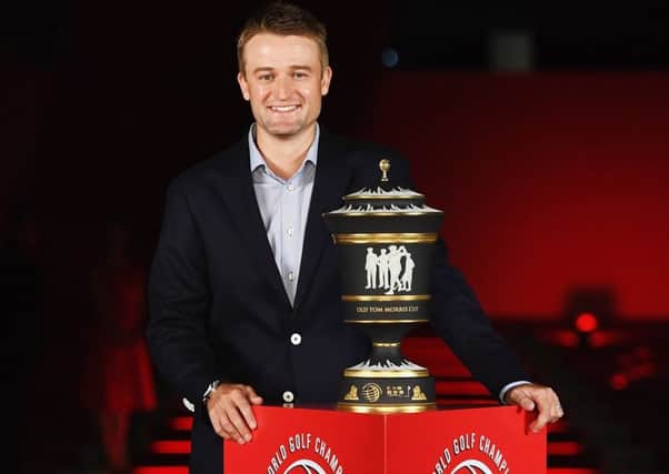 Scotland's Russell Knox poses  with the Old Tom Morris Cup prior to the start of the WGC - HSBC Champions in Shanghai, China. Picture: Ross Kinnaird/Getty Images
