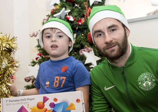 James Keatings was among members of the Hibernian  squad who  visited to the Royal Hospital for Sick Children. Picture: SNS.
