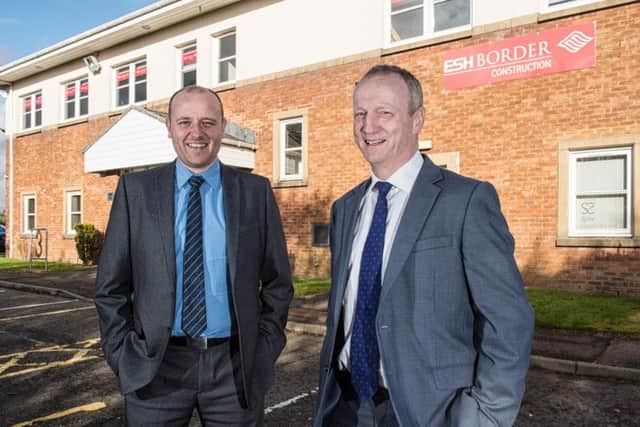 Left to right - business development manager Euan McDermott and regional managing director Simon Phillips celebrate the accreditation. Picture: Contributed