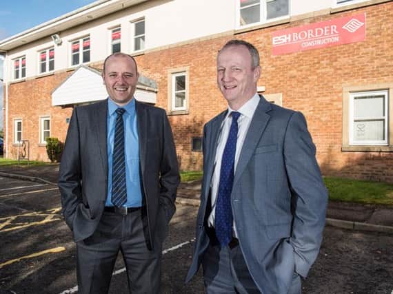 Left to right - business development manager Euan McDermott and regional managing director Simon Phillips celebrate the accreditation. Picture: Contributed