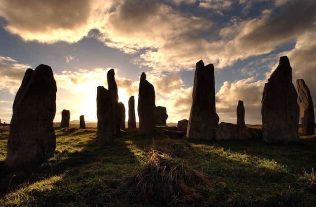 Attractions such as the standing stones at Calanais, on the Isle of Lewis, help bring in Â£2.3 billion a year to the Scottish economy. Picture: Ian Rutherford