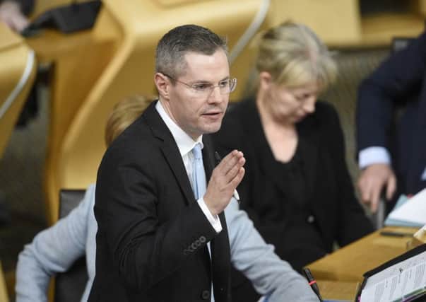 Finance Secretary Derek Mackay delivers the Scottish Government budget plans for the coming year. Picture: Greg Macvean